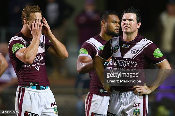 Daly Cherry-Evans and Jamie Lyon of the Eagles looks dejected after a Panthers try during the round 10 NRL match between the Manly Sea Eagles and the...