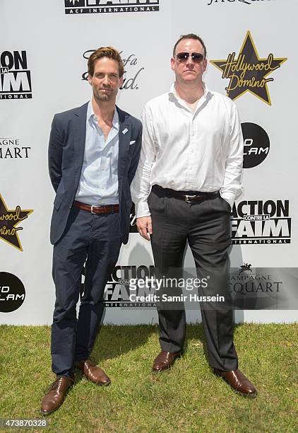 Alex Cottin and CEO of Action Againts Hunger Mike Penrose attend the Hollywood Domino Cannes Benefiting Action Against Hunger Nepal Earthquake...