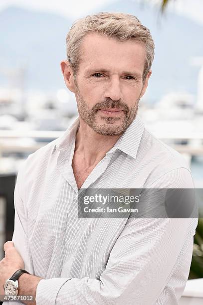 Lambert Wilson attends the photocall for "Enrages" during the 68th annual Cannes Film Festival on May 18, 2015 in Cannes, France.