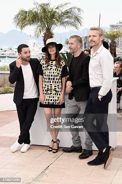 Actor Guillaume Gouix, actress Virginie Ledoyen, director Eric Hannezo and actor Lambert Wilson attend the photocall for "Enrages" during the 68th...