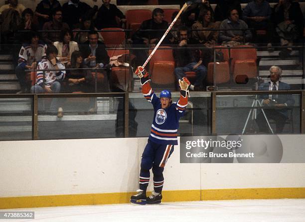 Wayne Gretzky of the Edmonton Oilers celebrates a goal during an NHL game against the New York Rangers on November 14, 1982 at the Madison Square...