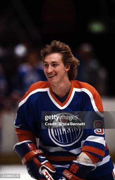Wayne Gretzky of the Edmonton Oilers skates on the ice during warm-ups before an NHL game circa 1982.