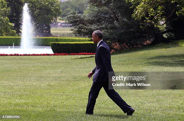 President Barack Obama walks to Marine One while departing the White House, May 18, 2015 in Washington, DC. President Obama is traveling to Camden...