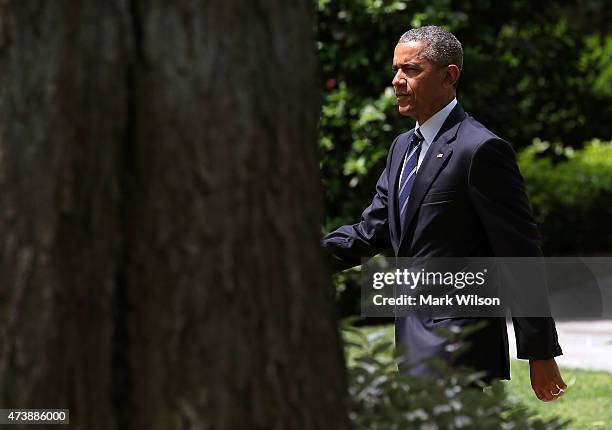 President Barack Obama walks to Marine One while departing the White House, May 18, 2015 in Washington, DC. President Obama is traveling to Camden...