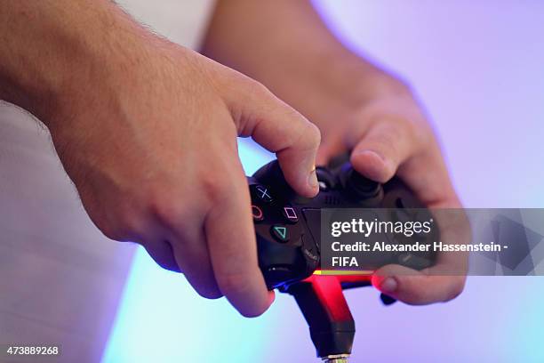 The PS4 wireless controller during the group stage of the finale for FIFA Interactive World Cup 2015 at Palais am Lenbachplatz on May 18, 2015 in...