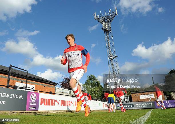 Krystian Bielik of Arsenal warms up before the match between Arsenal U21s and Wolverhampton Wanderers U21s at Meadow Park on May 18, 2015 in...