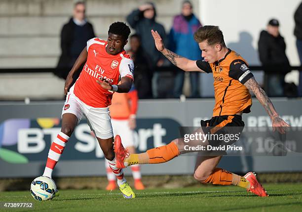 Ainsley Maitland-Niles of Arsenal takes on Ashley Carter of Wolves during the match between Arsenal U21s and Wolverhampton Wanderers U21s at Meadow...