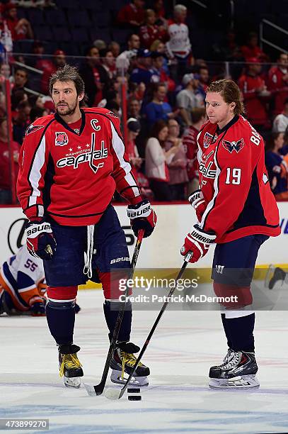 Nicklas Backstrom and Alex Ovechkin of the Washington Capitals warm up prior to playing against the New York Islanders in Game Seven of the Eastern...