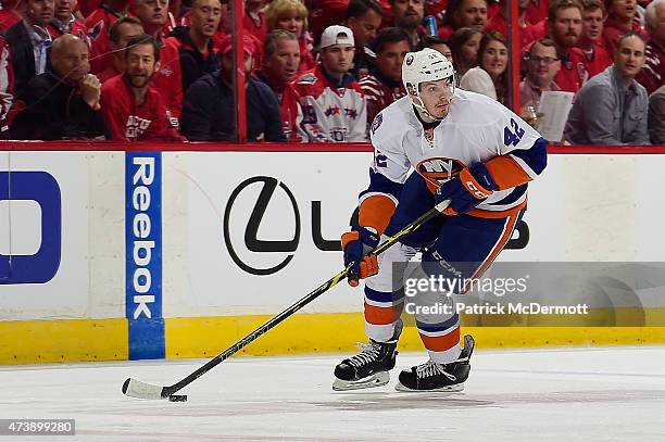 Scott Mayfield of the New York Islanders controls the puck against the Washington Capitals during the first period in Game Seven of the Eastern...