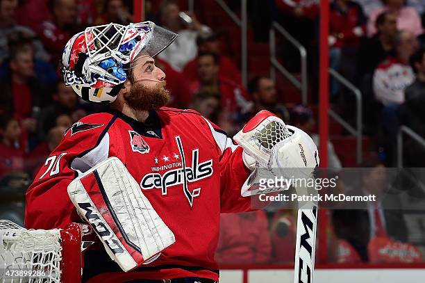 Braden Holtby of the Washington Capitals reacts during a stoppage in play in the first period against the New York Islanders in Game Seven of the...