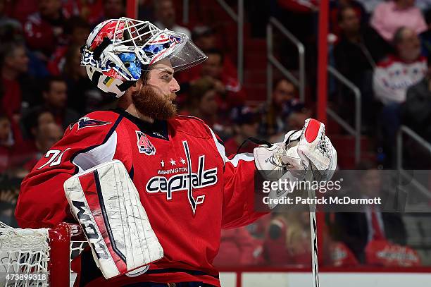 Braden Holtby of the Washington Capitals reacts during a stoppage in play in the first period against the New York Islanders in Game Seven of the...