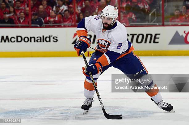 Nick Leddy of the New York Islanders controls the puck against the Washington Capitals during the first period in Game Seven of the Eastern...