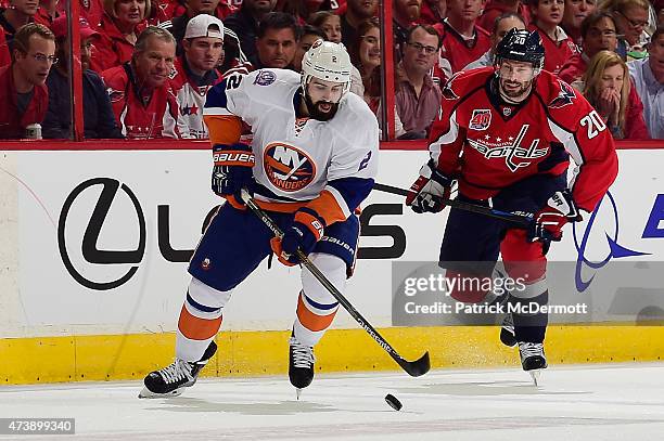 Nick Leddy of the New York Islanders controls the puck against the Washington Capitals during the first period in Game Seven of the Eastern...