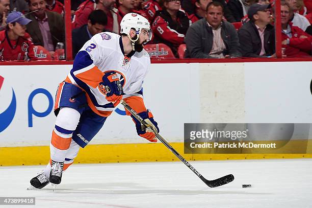 Nick Leddy of the New York Islanders controls the puck against the Washington Capitals during the second period in Game Seven of the Eastern...