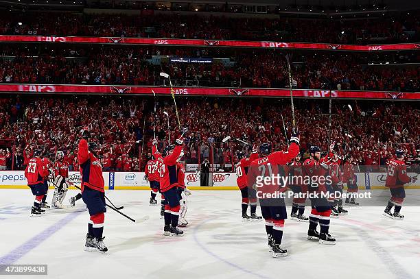 The Washington Capitals celebrate after defeating the New York Islanders 2-1 in Game Seven of the Eastern Conference Quarterfinals during the 2015...