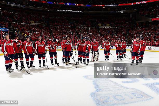 The Washington Capitals celebrate after defeating the New York Islanders 2-1 in Game Seven of the Eastern Conference Quarterfinals during the 2015...