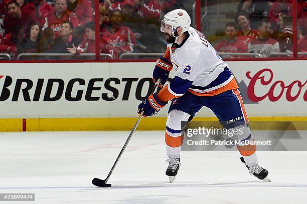 Nick Leddy of the New York Islanders controls the puck against the Washington Capitals during the third period in Game Seven of the Eastern...