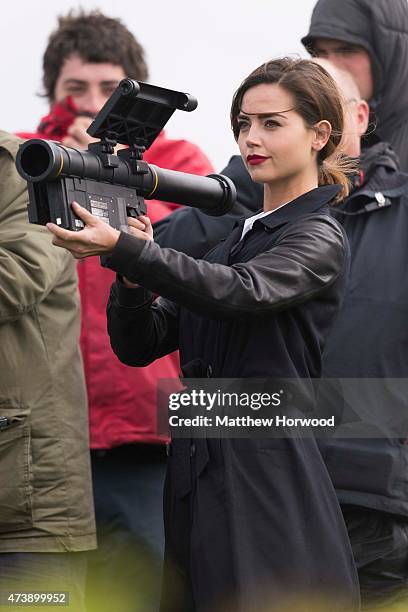 The Doctor's companion Jenna Coleman who plays Clara Oswald is spotted holding a rocket launcher during filming for the ninth series of BBC show...