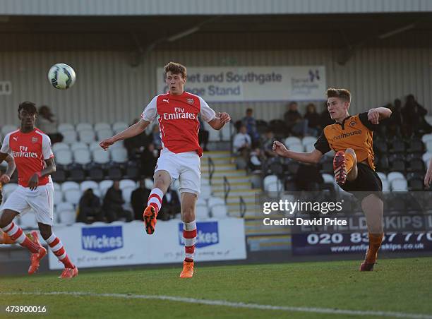 Regan Upton of Wolves scores an own goal, Arsenal's 4th goal under pressure from Krystian Bielik of Arsenal during the match between Arsenal U21s and...