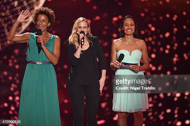 The hosts Mirjam Weichselbraun, Alice Tumler and Arabella Kiesbauer peform during a rehearsal of the first Semin Final on May 18, 2015 in Vienna,...