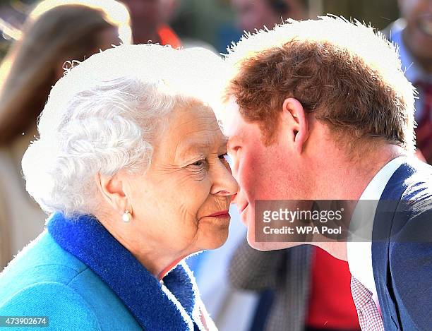 Queen Elizabeth II and Prince Harry attend at the annual Chelsea Flower show at Royal Hospital Chelsea on May 18, 2015 in London, England.
