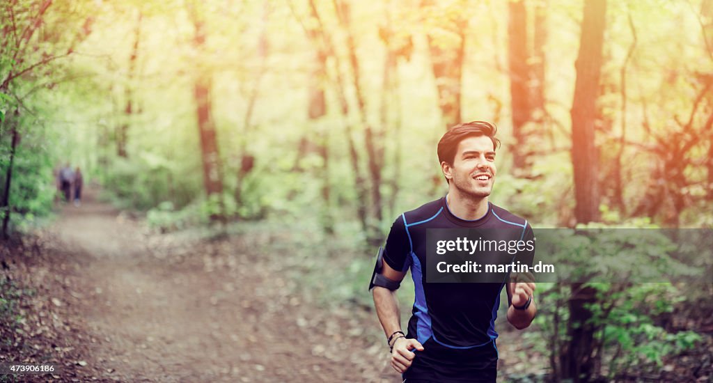 Young man jogging in the park