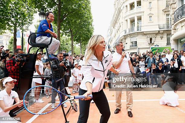 Russian tennis player Maria Sharapova and former American tennis player Michael Chang participate to the Association Theodora fund event organized by...