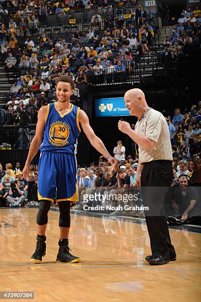Stephen Curry of the Golden State Warriors and NBA Referee Joe Crawford speak during a game against the Memphis Grizzlies in Game Six of the Western...