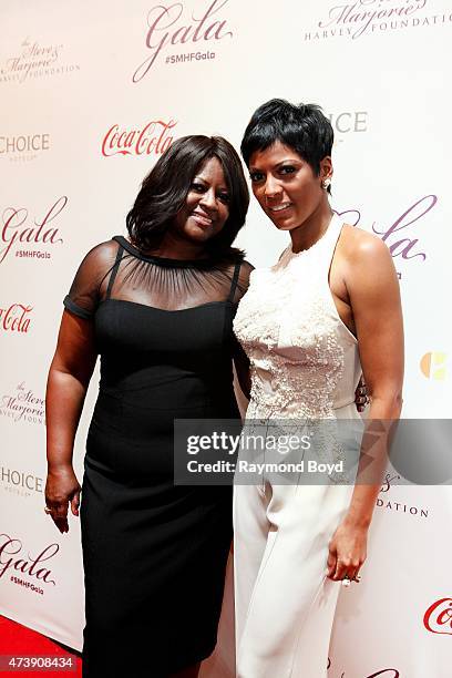 News anchor Tamron Hall and her mother Mary Newton attends the 2015 Steve and Marjorie Harvey Foundation Gala at the Hilton Chicago on May 16, 2015...