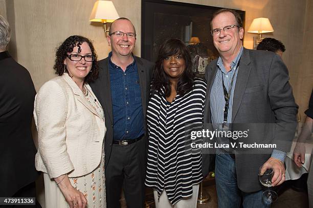 Karen Needham, Col Needham, Chaz Ebert and Peter Hammond attend the IMDb's 2015 Cannes film festival dinner party at Restaurant Mantel May 18, 2015...