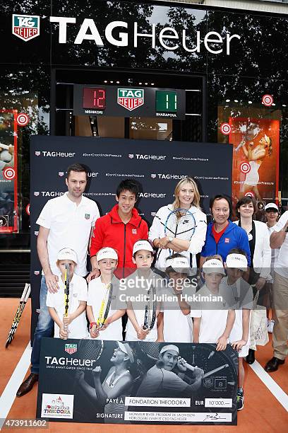 Tag Heuer France Director Managing Mathieu Selzer, Japanese tennis champion Kei Nishikori, Russian tennis champion Maria Sharapova, former American...