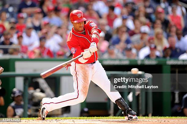 Yunel Escobar of the Washington Nationals takes a swing during a baseball game against the Atlanta Braves at National Park on May 9, 2015 in...