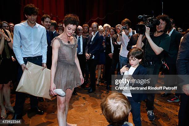 Star Dancer Aurelie Dupont, here with her sons Jacques and Georges, also receiving presents, says goodbye to the Paris Opera performing in...