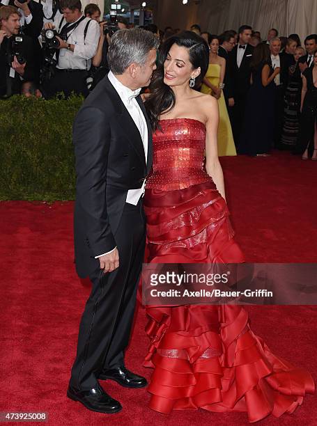 Actor George Clooney and lawyer Amal Clooney attend the 'China: Through The Looking Glass' Costume Institute Benefit Gala at the Metropolitan Museum...