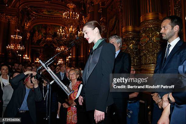 Star Dancer Aurelie Dupont and Paris National Opera dance director Benjamin Millepied attend Star Dancer Aurelie Dupont receives the medal of...