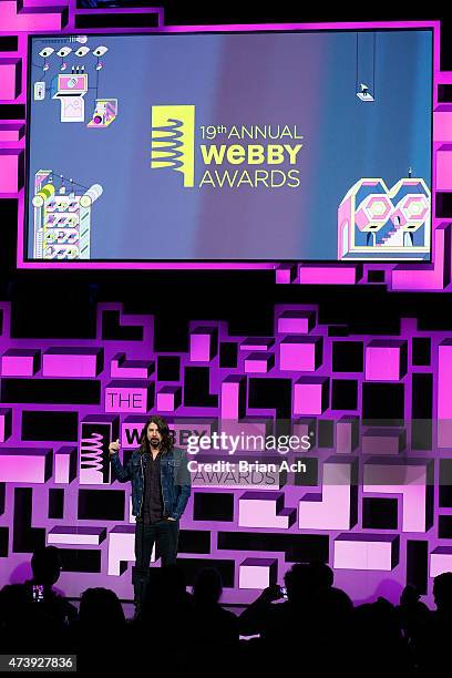 Musician Dave Grohl presents an award on stage at the 19th Annual Webby Awards on May 18, 2015 in New York City.