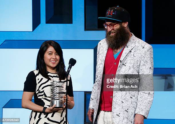 Sabrina Majeed and Jesse Shapins of Buzzfeed accept an award for Mobile Sites & Apps at the 19th Annual Webby Awards on May 18, 2015 in New York City.