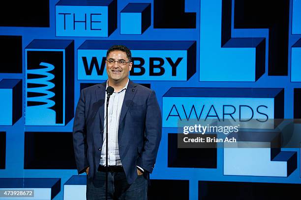 Columnist Cenk Uygur speaks on stage at the 19th Annual Webby Awards on May 18, 2015 in New York City.