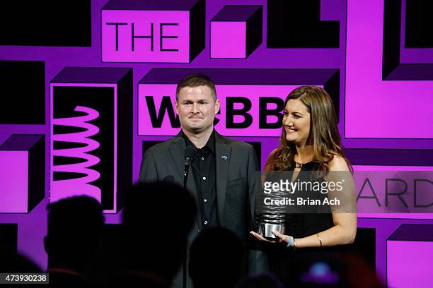 Pat Quinn and Jennifer Quinn accept an award on stage during the 19th Annual Webby Awards on May 18, 2015 in New York City.