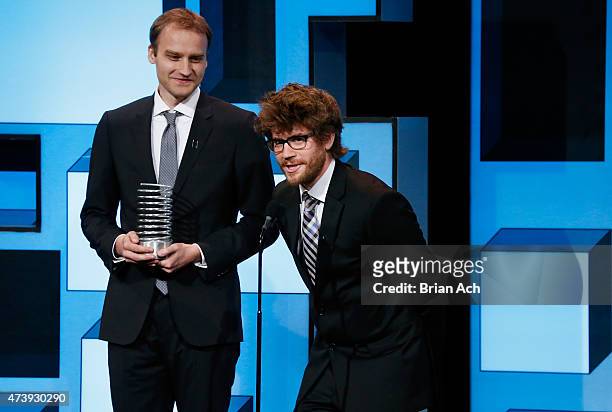 Alex Karpenko and Thomas Dimson of the OutCast Agency accept an award on stage during the 19th Annual Webby Awards on May 18, 2015 in New York City.