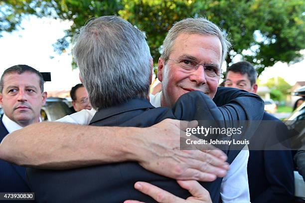 Former Florida Governor and potential Republican presidential candidate Jeb Bush greets people as he attends a fundraising event at the Jorge Mas...