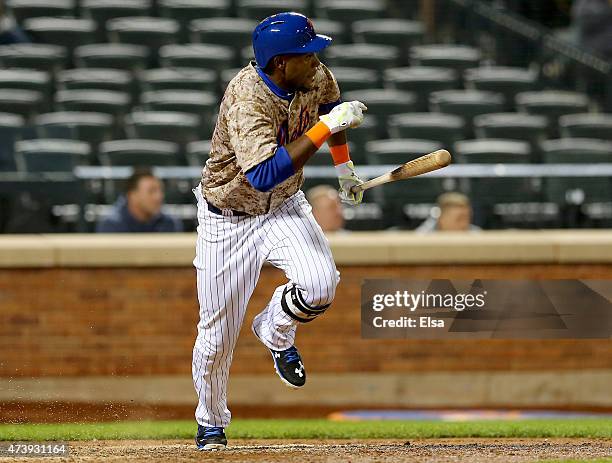 John Mayberry Jr. #44 of the New York Mets drives in the game winning run in the bottom of the 14th inning against the St. Louis Cardinals on May 18,...