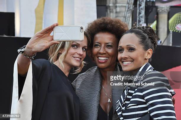 Arabella Kiesbauer, Mirjam Weichselbraun and Alice Tumler pose during the Eurovision Song Contest 2015 Opening Ceremony at Rathaus Wien ahead of the...
