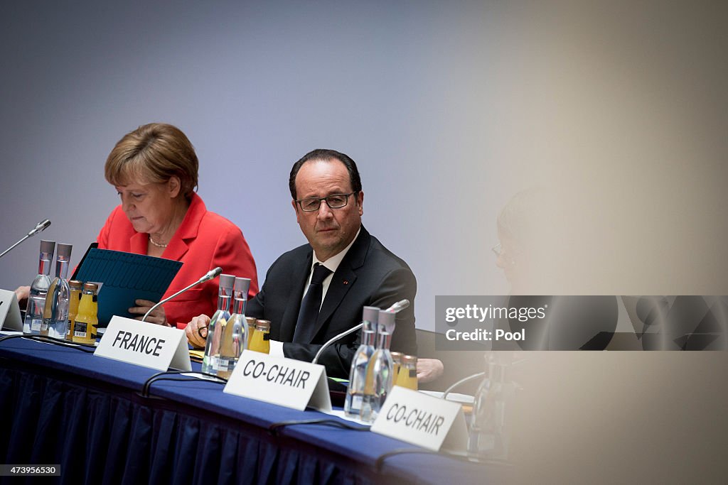 Merkel And Hollande Attend Petersburger Climate Conference