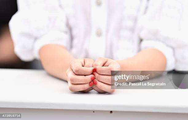 Actress Anais Demoustier, fashion detail, attends a photocall for "Marguerite And Julien" during the 68th annual Cannes Film Festival on May 19, 2015...