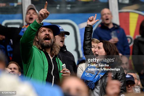 Supporters of Paderborn cheer their team during the Bundesliga match between FC Schalke 04 and SC Paderborn on May 16, 2015 in Gelsenkirchen, Germany.