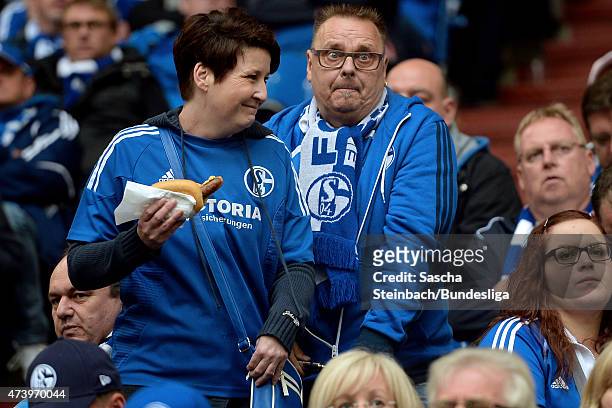 Fan with a stadium sausage is seen during the Bundesliga match between FC Schalke 04 and SC Paderborn on May 16, 2015 in Gelsenkirchen, Germany.
