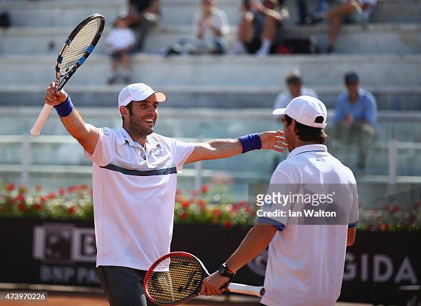 Pablo Cuevas of Argentina and David Marrero of Spain celebrates winning their Men's Doubles Final match against Marcel Granollers and Marc López of...