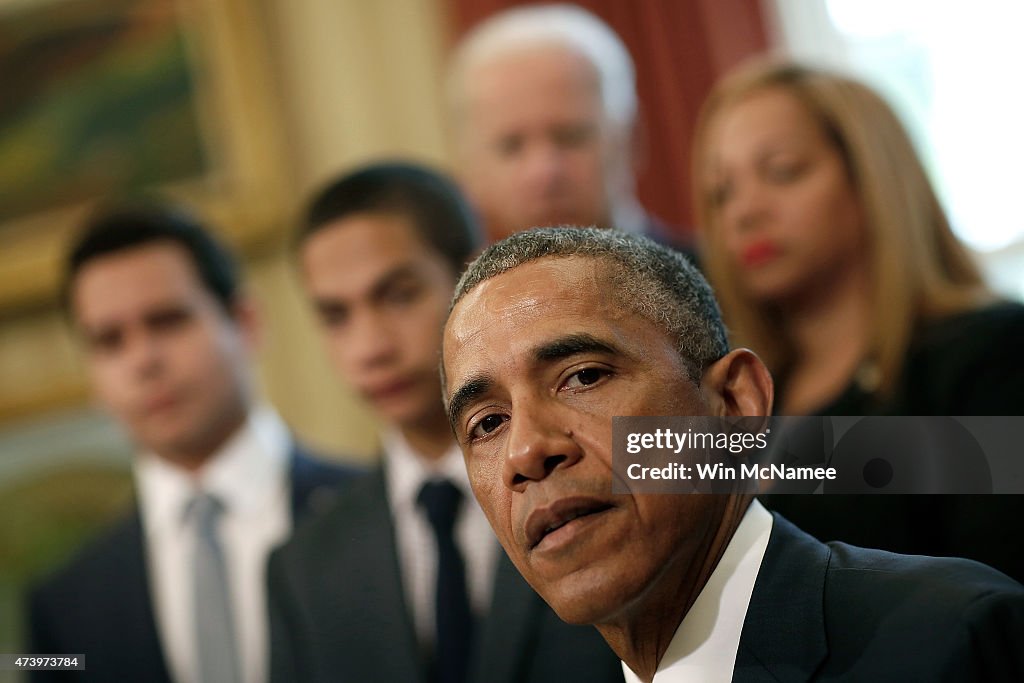 President Obama Signs Rafael Ramos And Wenjian Liu National Blue Alert Act