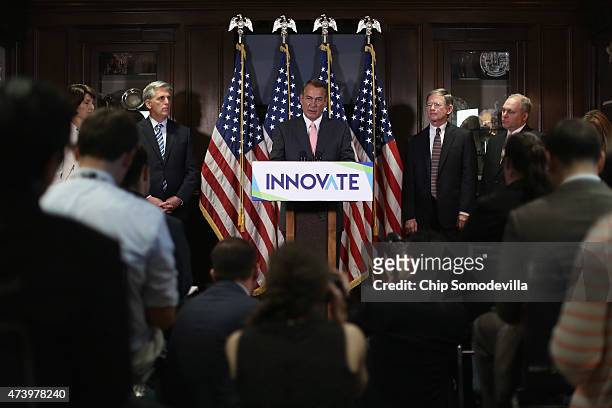 Speaker of the House John Boehner talks to reporters with House Majority Leader Kevin McCarthy , Rep. Lamar Smith and House Majoity Whip Steve...
